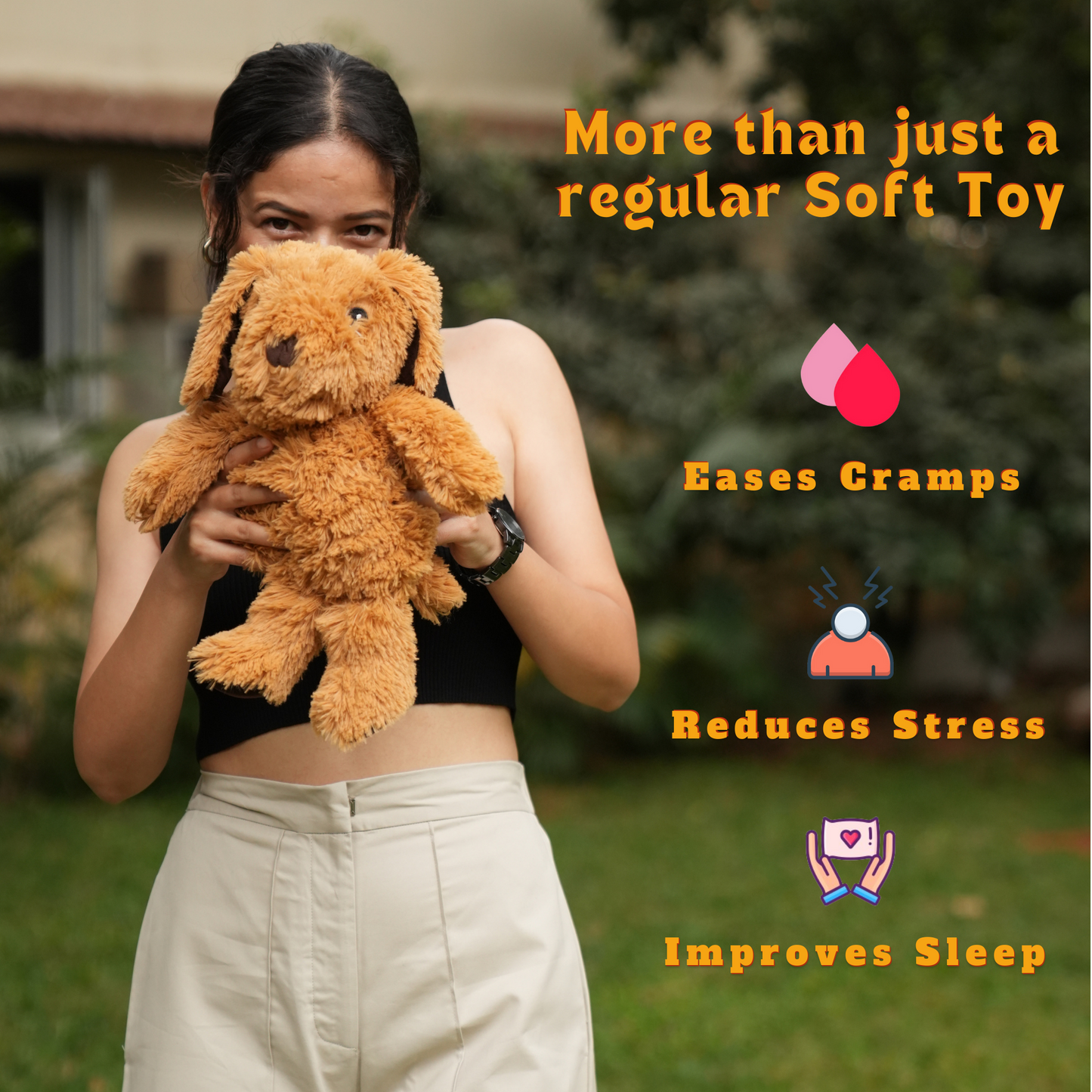 Woman holding a brown soft toy by SOUL that eases cramps reduces stress and improves sleep